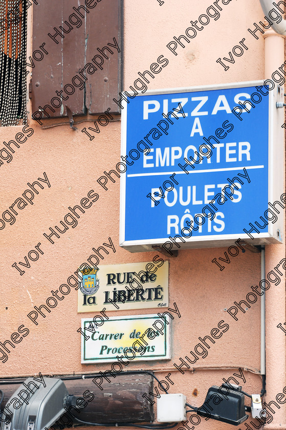 D3S 8932 
 Keywords: Collioure village fishing port Roussillon France 66 June 2014 strret sign pizzas roast chicken shutters rue de la libert