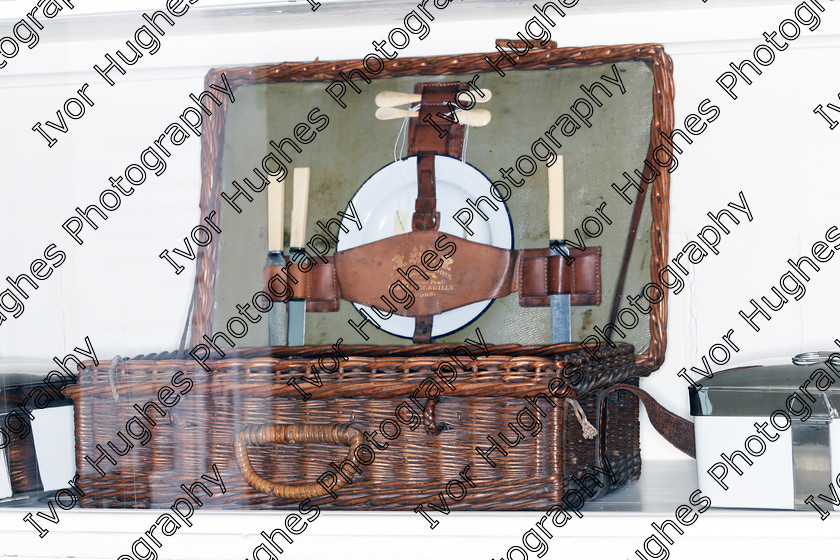 HK13 
 Keywords: Harewood House stately home mansion antique Georgian C18 kitchen wicker picnic hamper under glass