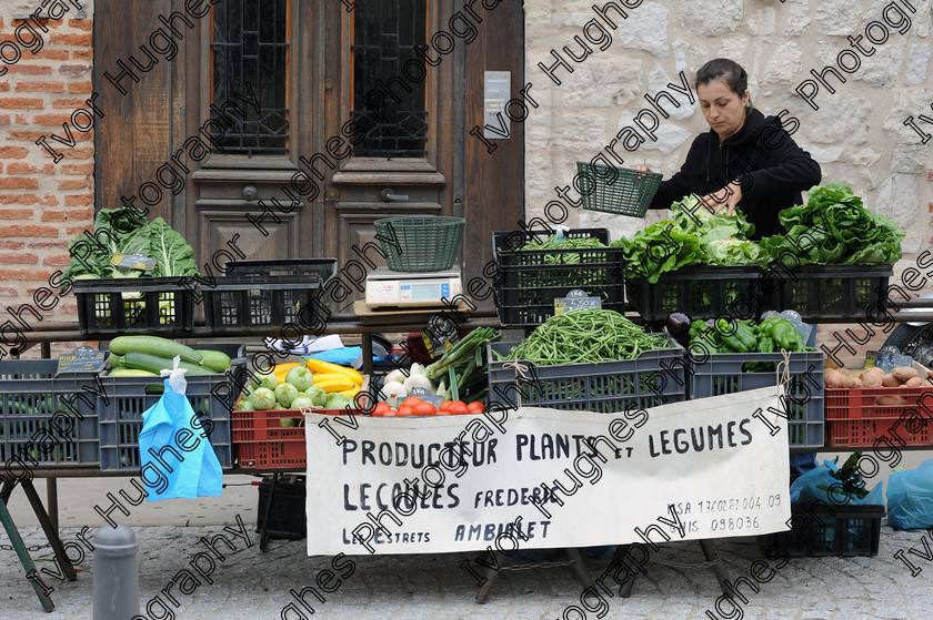 03 
 Albi town city centre Tarn France street market stall fruit vegetables Frederic Lecoules trader 
 Keywords: Albi town city centre Tarn France street market stall fruit vegetables Frederic Lecoules trader