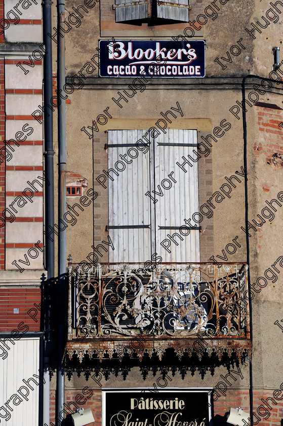 D3N2874 
 Albi town city centre Tarn France street old enamel sign wrought iron balcony wooden shutters 
 Keywords: Albi town city centre Tarn France street old enamel sign wrought iron balcony wooden shutters