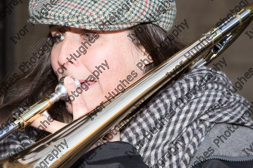 BV0A0055 
 Keywords: 2014 12 07 December Otley Yorkshire Victorian Fair woman trombone trombonist brass band