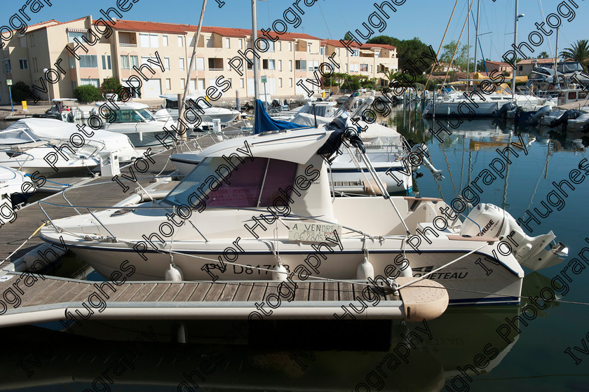 D3N 7584 
 Keywords: Boats St Cyprien Plage marina Perpignan 66 France dinghy sailing landing docking Languedoc Pyrenees Mediterranean sea port fishing Catalan motor